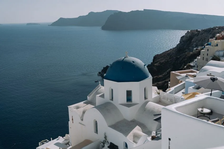 blue-domed churches overlooking the Aegean Sea in Santorini