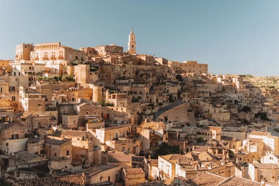 Matera stone dwellings under golden light